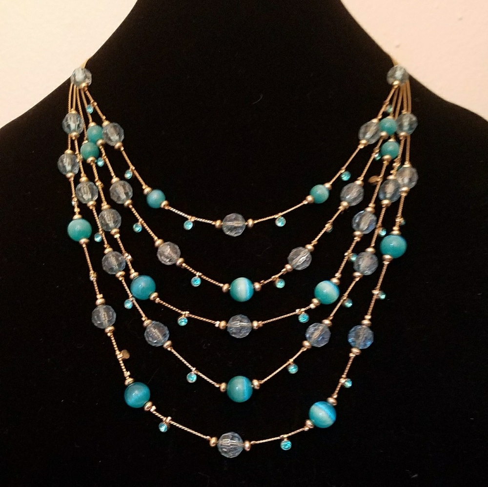 Turquoise colored Cats Eye Necklace